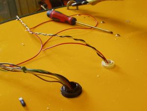 wires emerging through deck